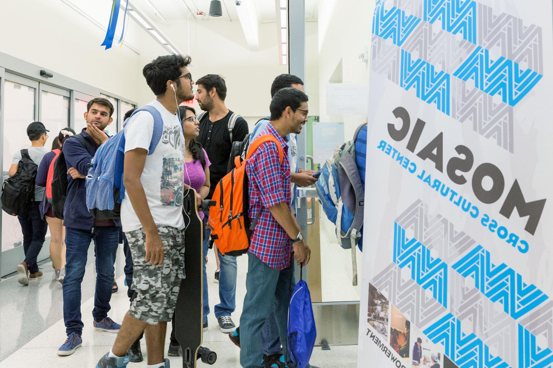 Students entering the MOSAIC Cross Cultural Center at the Student Union.